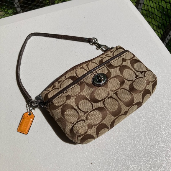 Coach Tan Brown Signature C Logo Print Turn Lock Silver Hardware Wristlet Orange - Picture 1 of 17